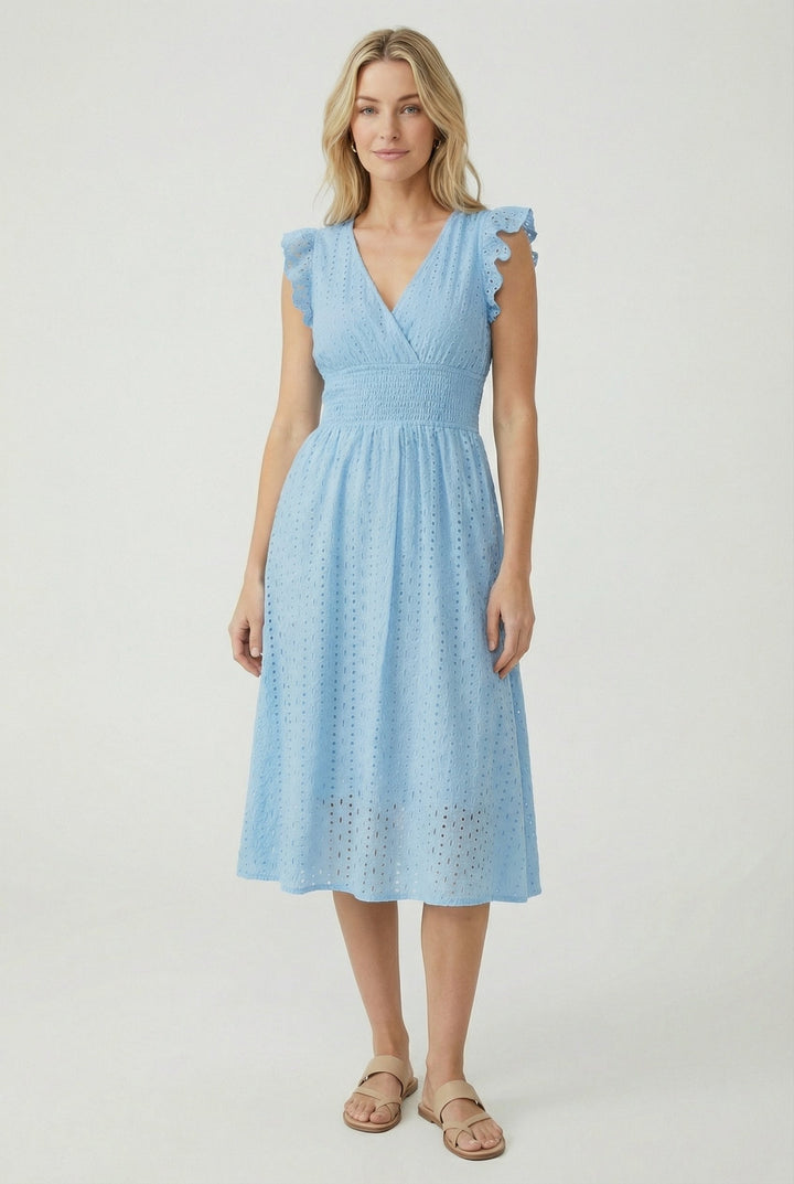 Women's vacation eyelet midi dress, flared skirt, short ruffled sleeves, offering a relaxed fit.