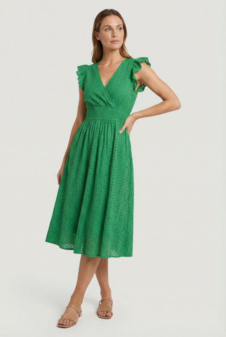 Comfortable women's eyelet midi dress, flared, with ruffled sleeves, ideal for elegant day wear.