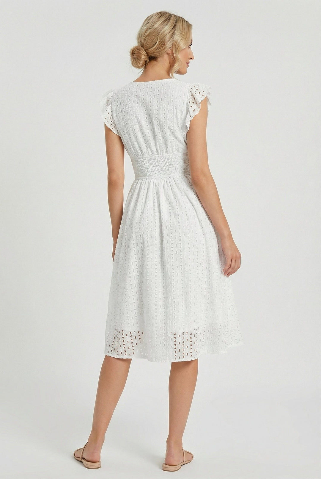 Casual women's summer midi dress, eyelet fabric, smocked waist, and charming ruffled sleeves.