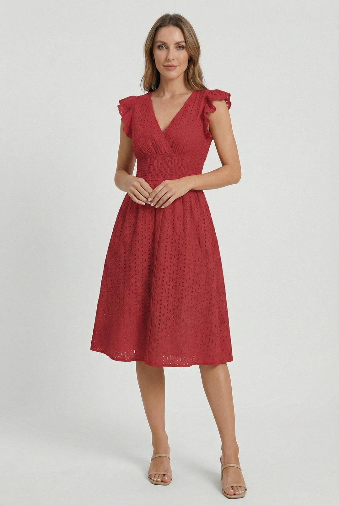 Flowy women's casual eyelet midi dress, ruffled sleeves, smocked waist, perfect for warm days.