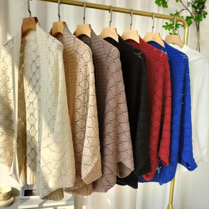 Women's white knit diamond hollow short shawl cardigan, perfect for summer fashion and beachwear.