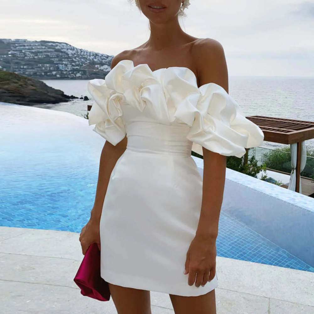 Women's white ruffle mini dress, perfect for a wedding guest or cocktail party, sleeveless evening wear