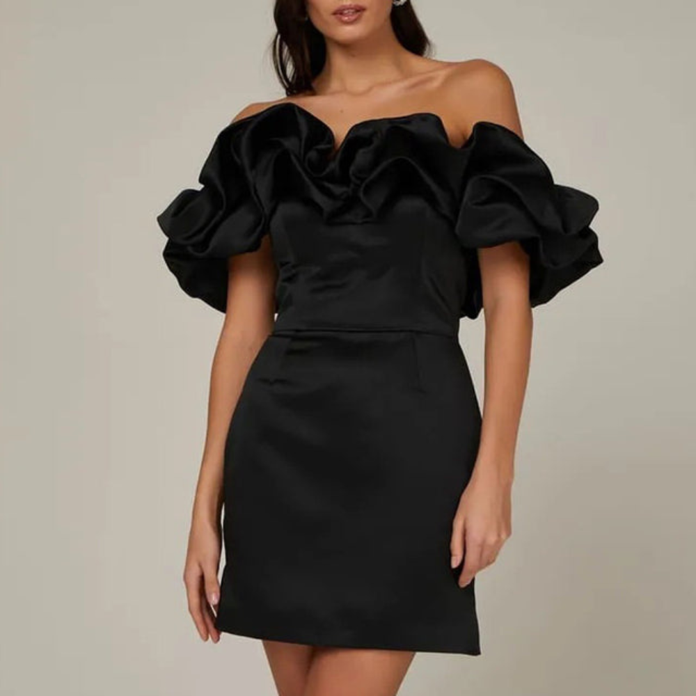 Elegant women's ruffle mini dress in white, ideal for wedding guest or party, sleeveless cocktail attire