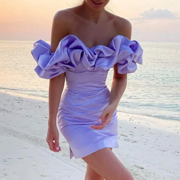 Stylish white ruffled mini dress for women, suitable for wedding guest, party, or evening occasion