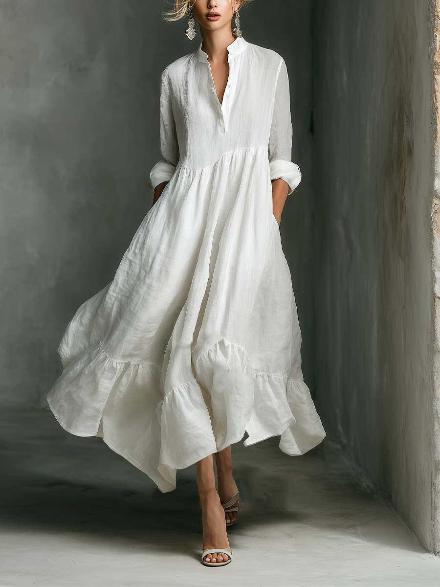 Women's white tiered maxi dress with stand collar, long sleeves, and flowy silhouette for summer comfort.