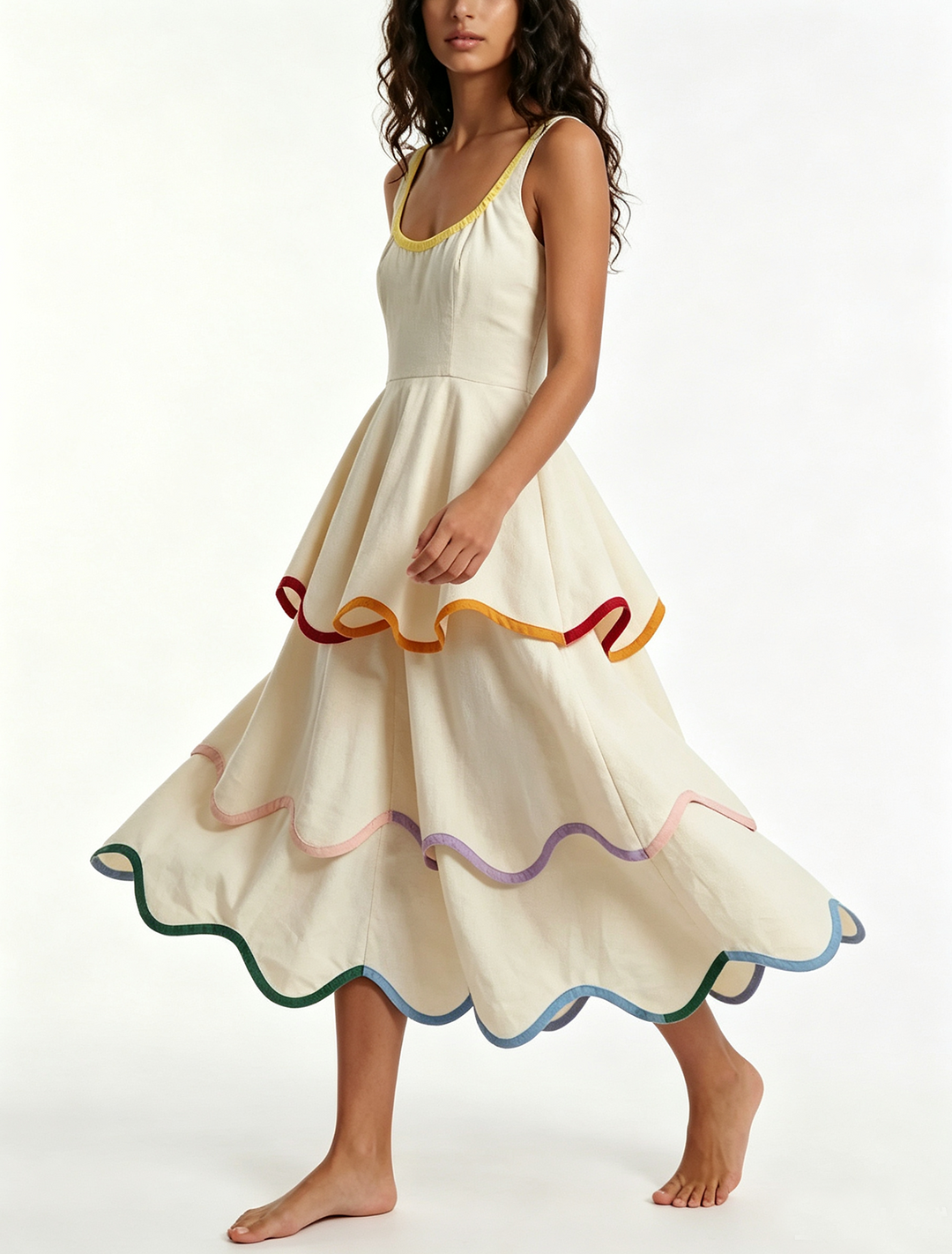 Chic women's white tiered maxi dress with colorful rainbow trim. Effortless sleeveless design for stylish summer outfits.