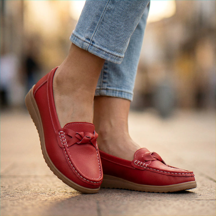 Supportive Women's Wide Fit Loafers: Orthopedic, slip-on design with built-in arch support.