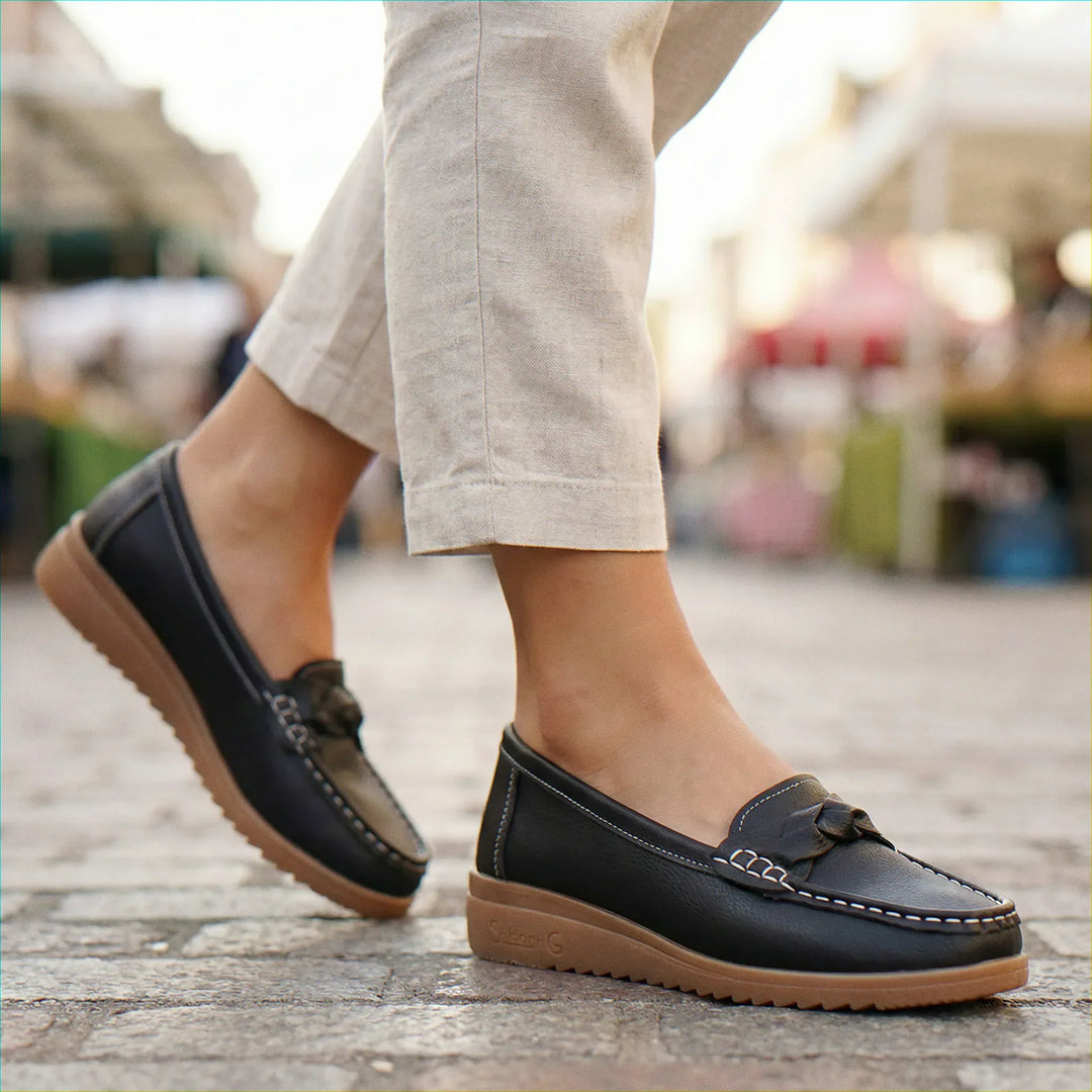Modern Women's Wide Fit Loafers: Orthopedic slip-on footwear, offering arch support for daily use.