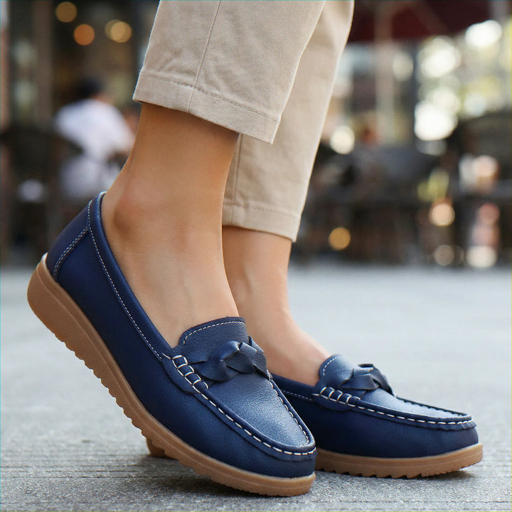 Therapeutic Women's Slip-On Loafers: Wide fit, orthopedic, providing targeted arch support.