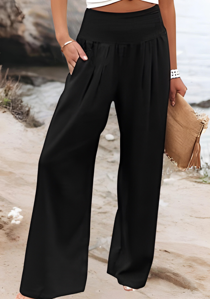 Flowing women's wide leg beach pants, casual & comfortable for summer vacations. Elastic waist for perfect fit.