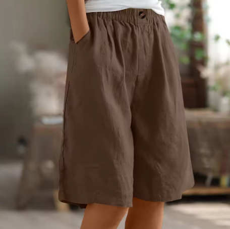 Women's fashionable wide leg Bermuda shorts with pockets, suitable for various summer activities.