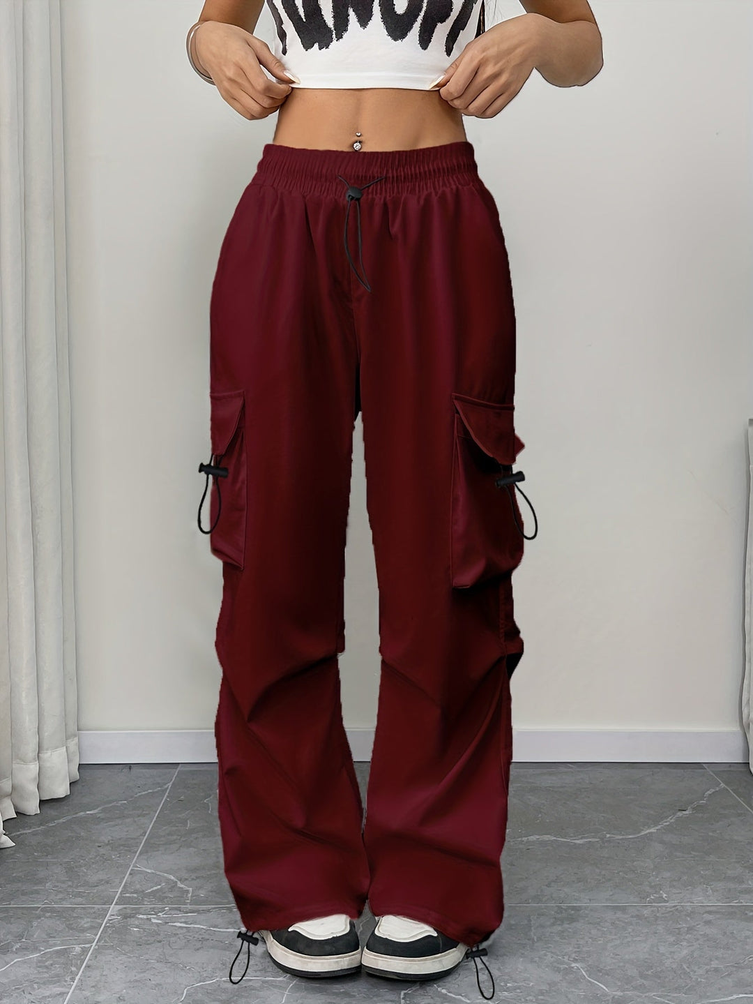 Effortless women's wide leg cargo pants. Relaxed fit, drawstring waist for everyday comfort & trendy style.