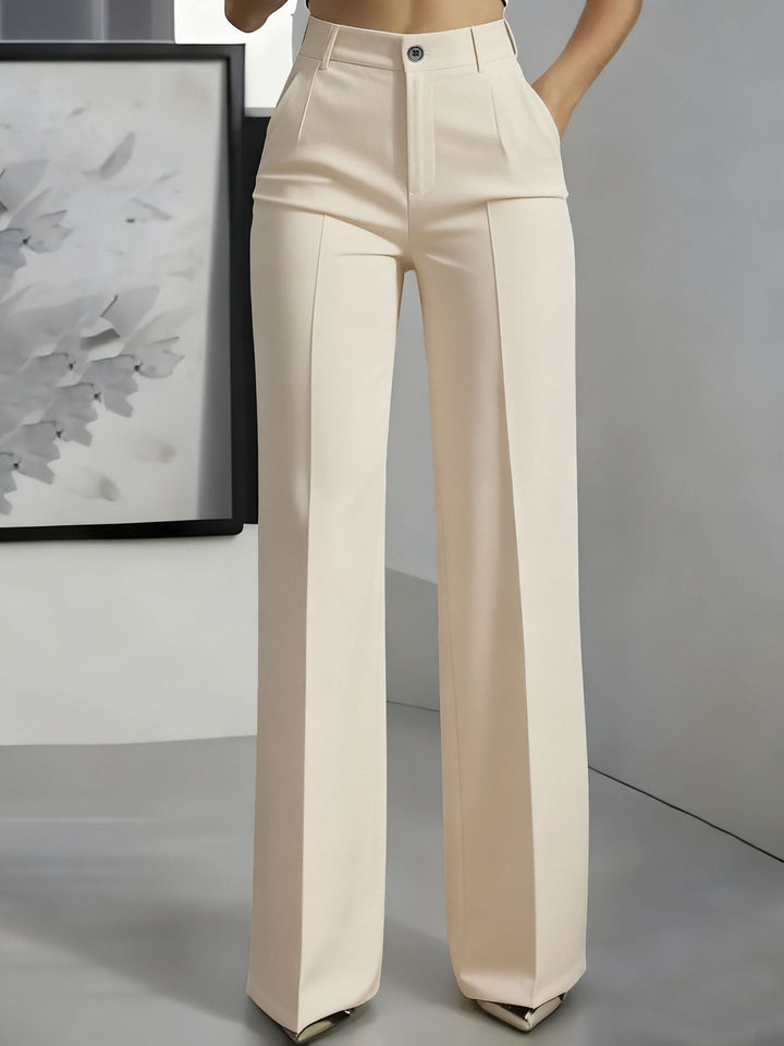 Flowy wide leg high waist trousers for women, offering a structured yet comfortable and chic silhouette.