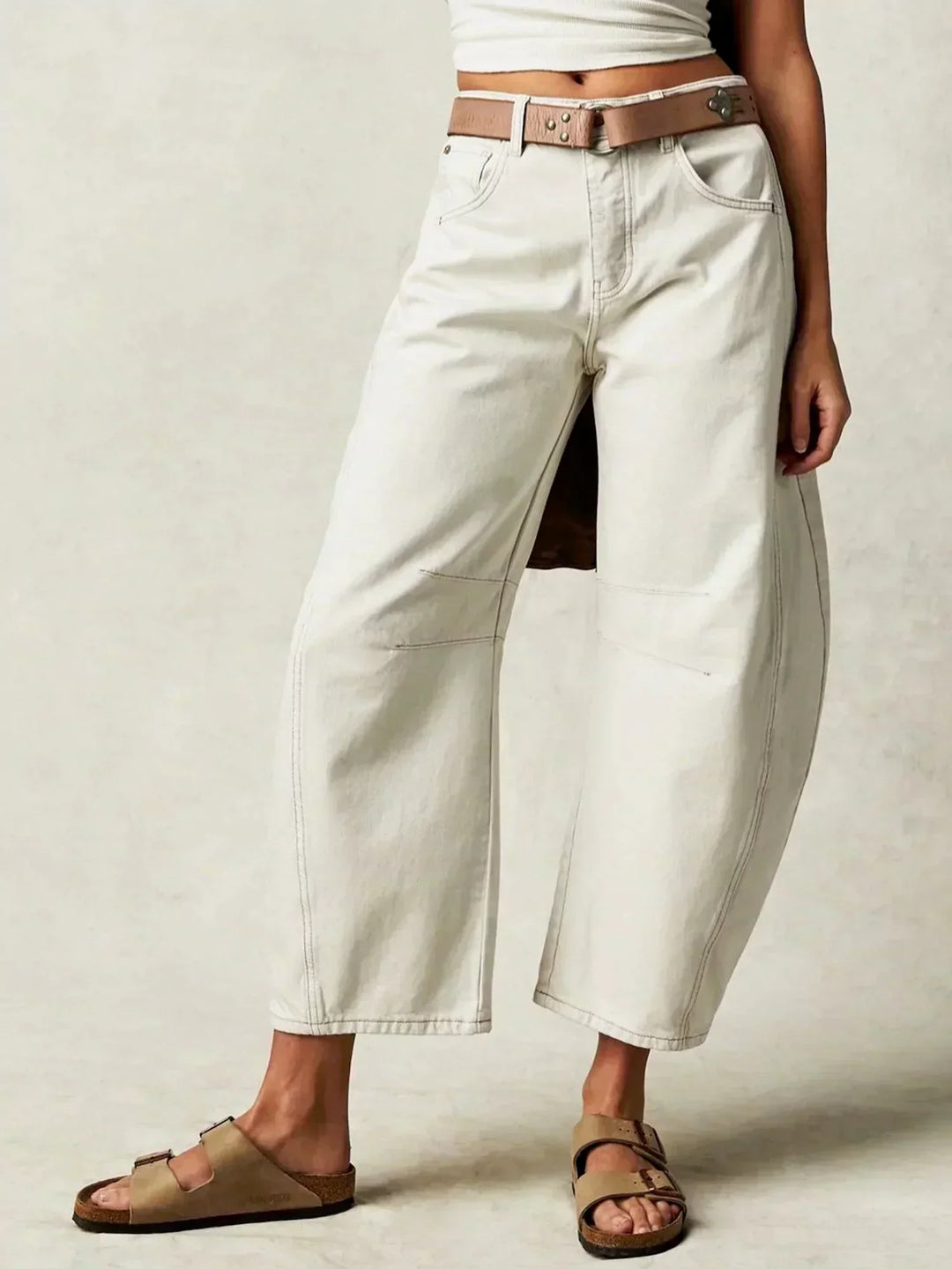 Modern women's wide leg high waisted denim jeans, great for a casual yet stylish outfit.