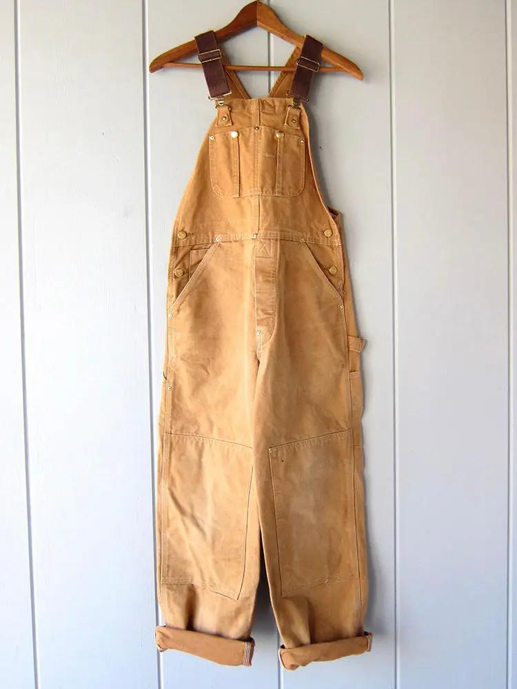 Stylish women's wide-leg jumpsuit with practical utility pockets & adjustable straps, great for versatile everyday wear.