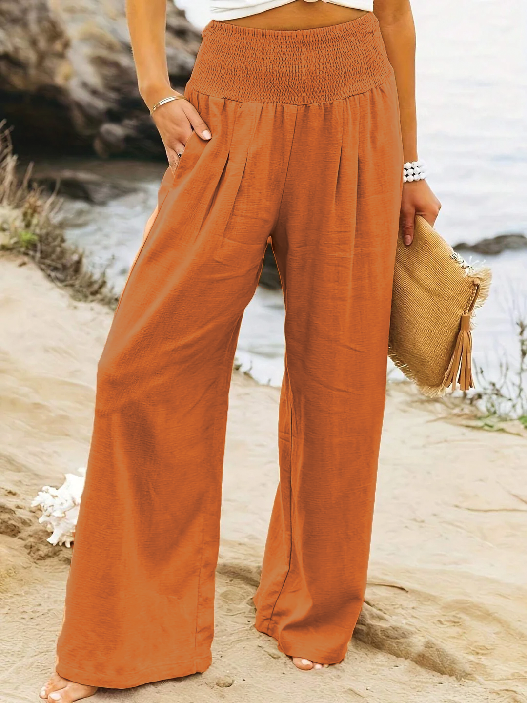 Women's relaxed fit wide leg linen pants. Casual high-waist comfort, ideal for spring/summer fashion.
