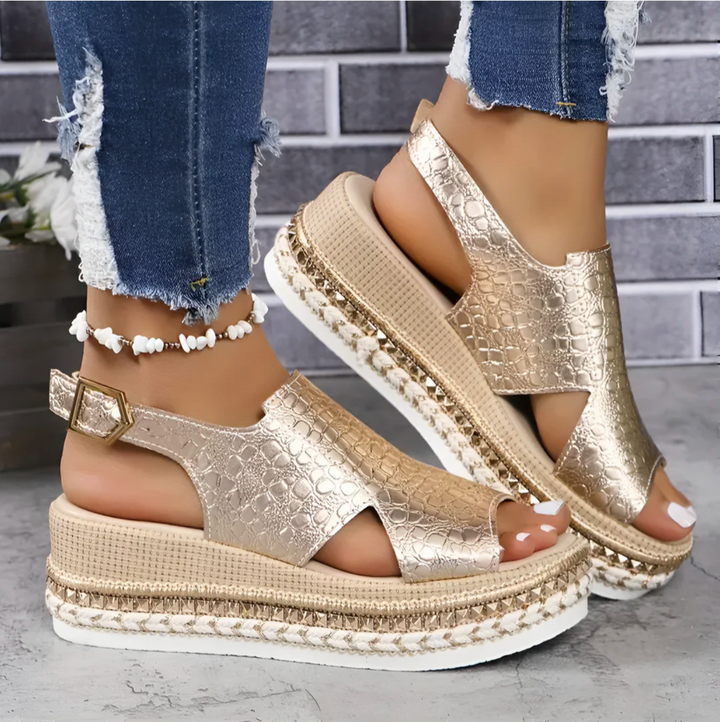 Stylish gold Zinnia women's wedge sandals with orthopedic support, comfortable for everyday summer wear.