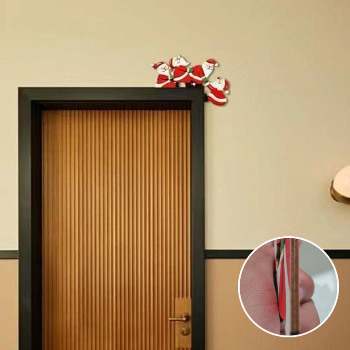 Intricate wooden Christmas door frame decoration, ideal for festive home ambiance.