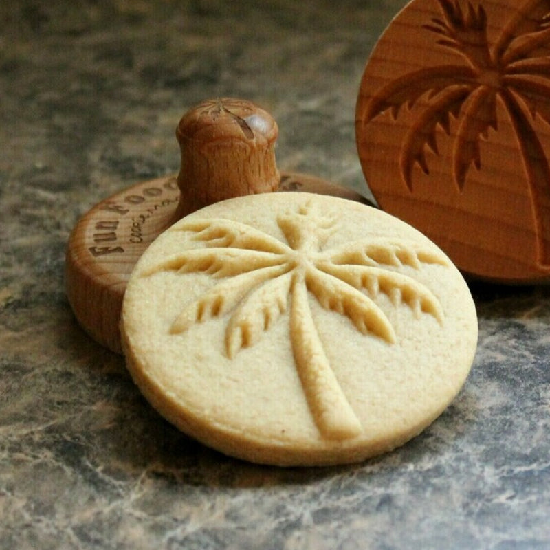 Wooden cookie embossing stamp mold with intricate floral pattern for baking and dessert decor