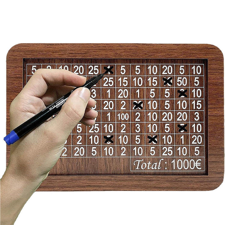 Hand placing coins into a stylish wooden money box with a visible savings tracker