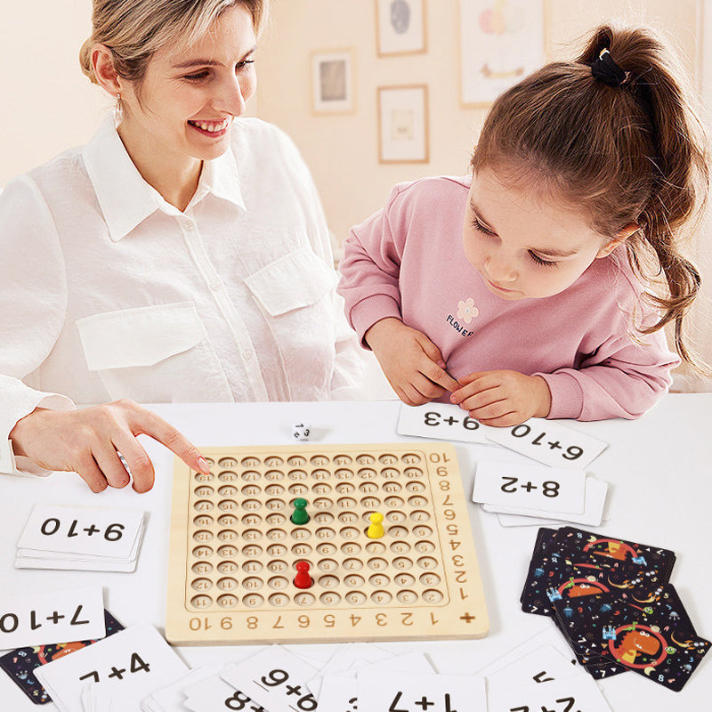 Kids playing with a wooden multiplication board game, enhancing math skills and early learning through play