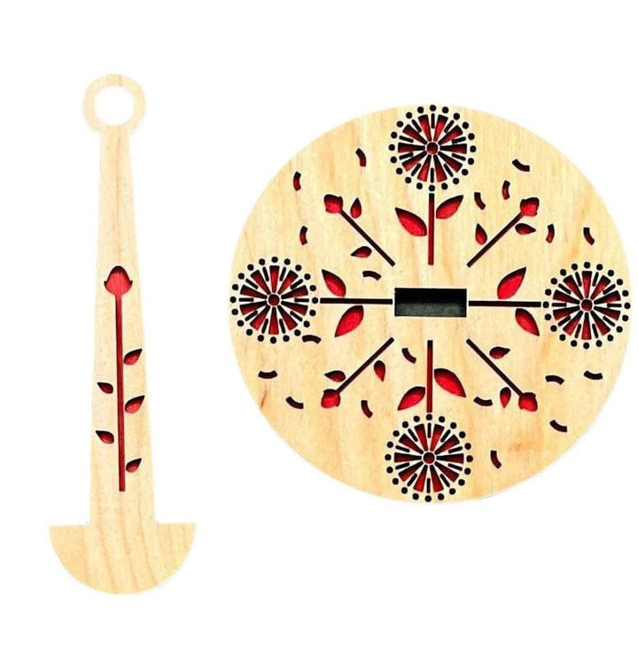 Close-up of a rotating wooden yarn ball holder, perfect for knitting and crochet projects.