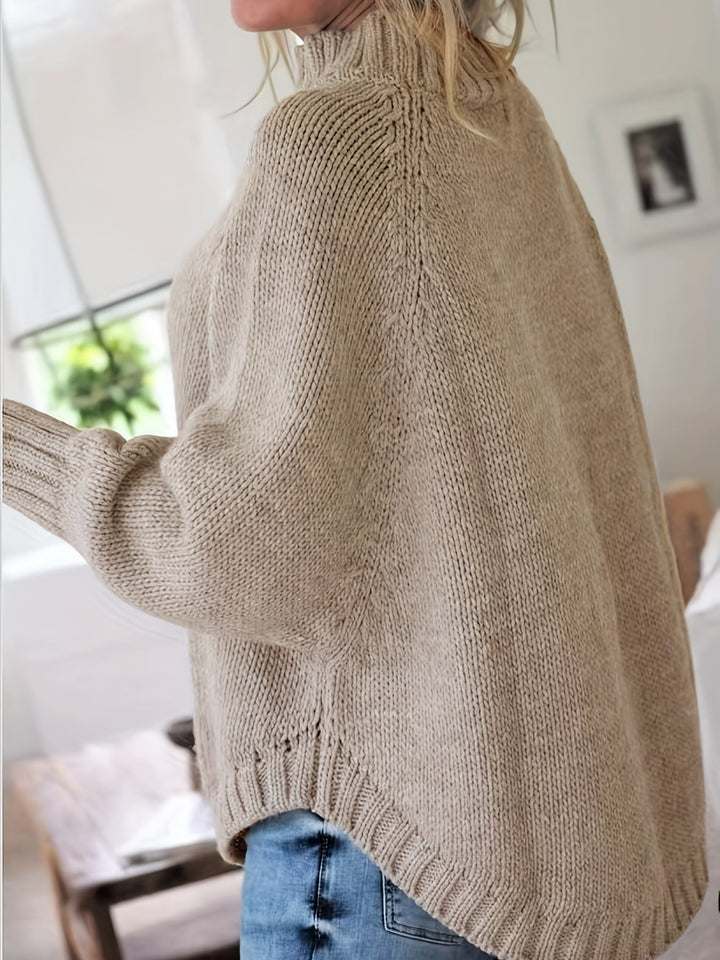 Wren women's patterned sweater, a cozy high neck, oversized, batwing sleeve top for fall fashion.