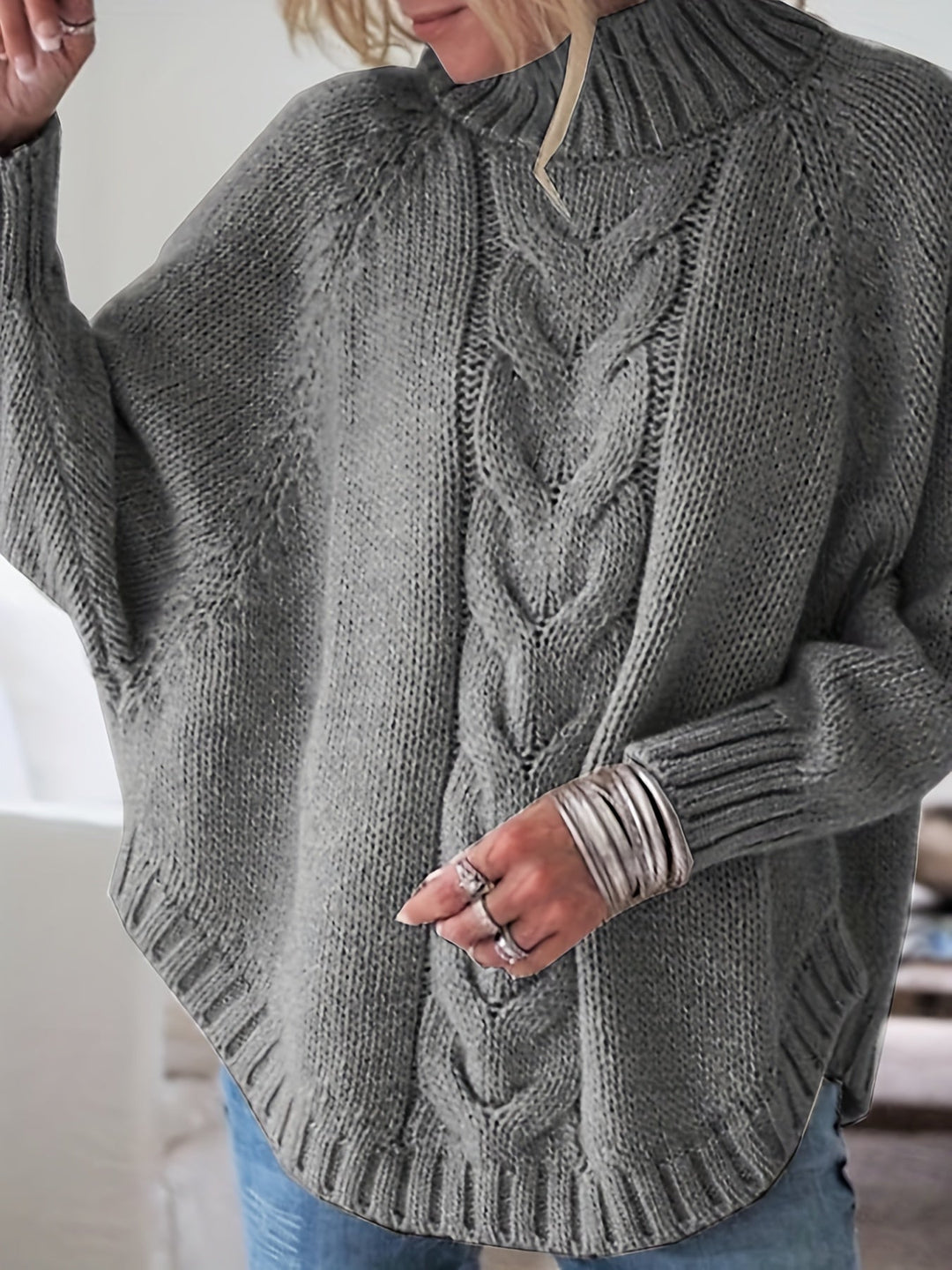 Cozy Wren women's patterned sweater, oversized with a high neck and batwing sleeves for fall style.