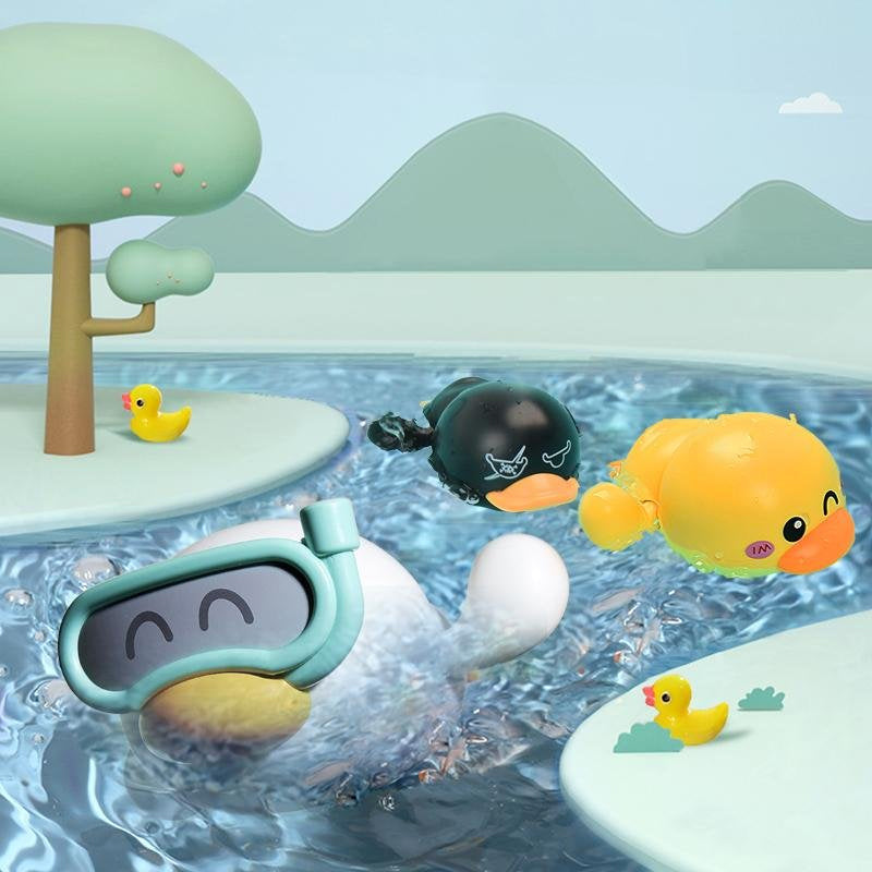 Toddler's hands playing with a bright yellow wind-up swimming duck bath toy in a tub