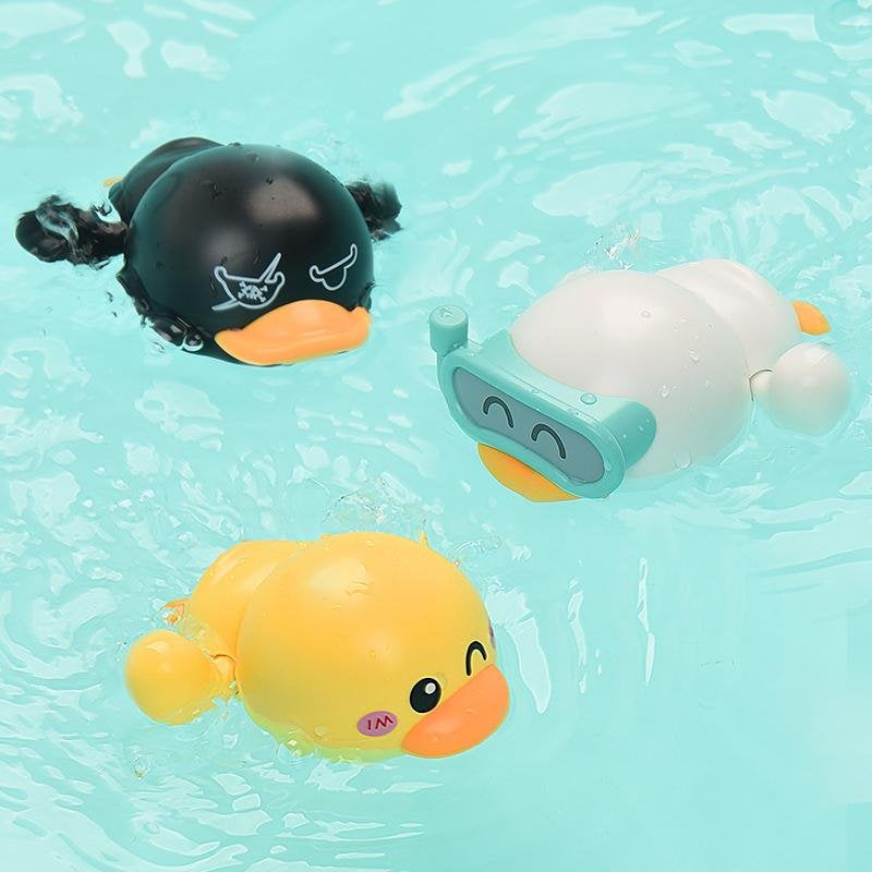 Side view of a safe wind-up duck bath toy, showcasing its flipper mechanism, for kids
